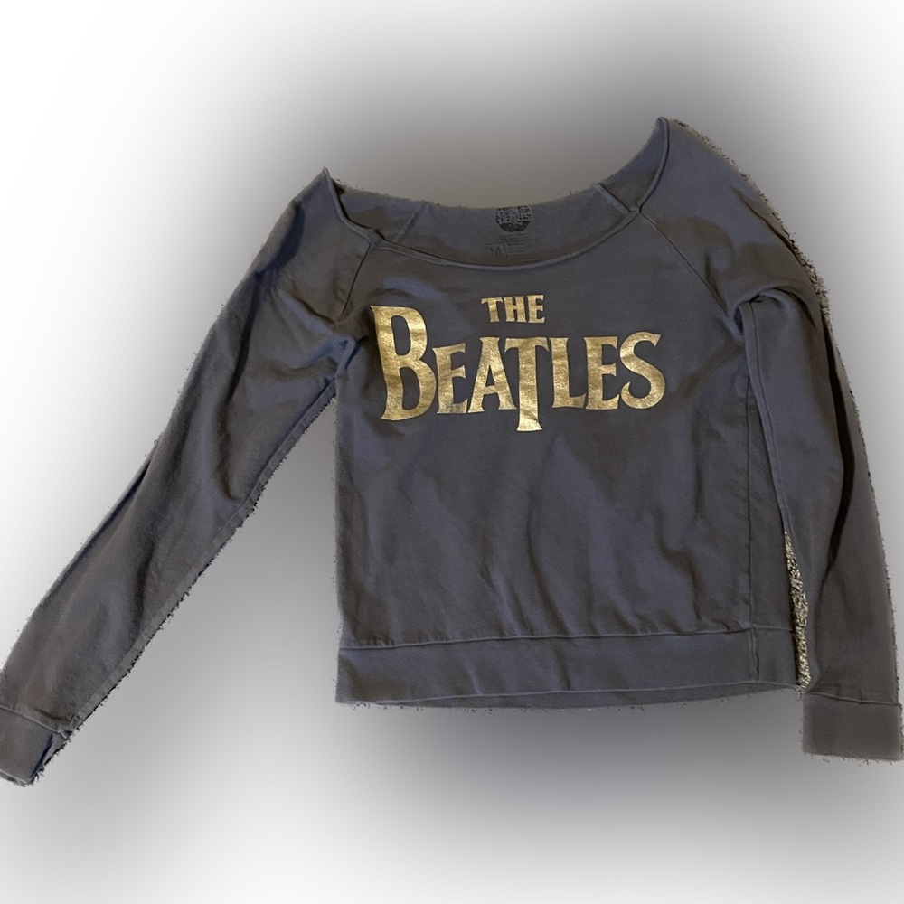 Grey long sleeve with gold lettering. Medium.
